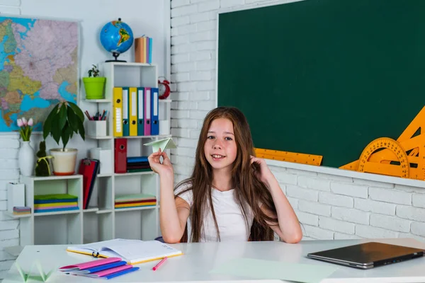 Happy child girl study subject at school, teachers day — Foto de Stock