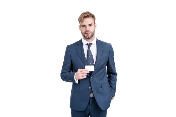 Businessman in businesslike suit showing empty credit or debit business card, copy space, business. — Stock Photo, Image