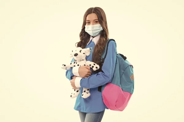 Back to school in pandemic. Child in mask. Toy safety. Education during COVID-19 pandemic