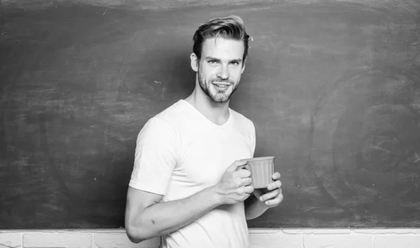 Time to take break. man in classroom. Time for rest. college life. school teacher need coffee break. good morning. back to school. energy and inspiration for education. man at blackboard drink coffee — Stock Photo, Image