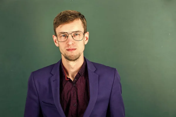 Man teacher wear eyeglasses for vision green chalkboard background, intelligent guy concept — Stock Photo, Image