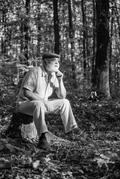 Fresh air. Idyllic moments. Grandpa vintage outfit in nature. Elderly people care. Nursing home. True values. Meaning of life. Nature is calling. Pensioner relax autumn nature. Natural environment