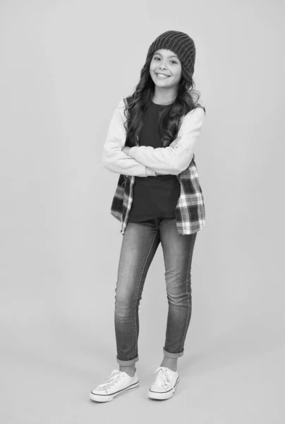 Cheerful kid wearing casual denim apparel and having long curly hair, style — Stock Photo, Image