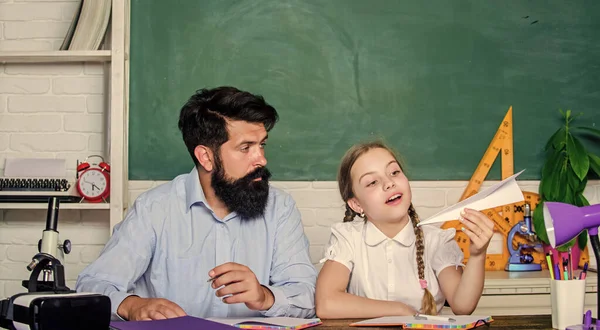 Creating a community of learners. Teacher and schoolgirl. Man bearded pedagogue and pupil having fun. Developing caring learners who are actively growing and achieving. School learners leisure — Stock Photo, Image