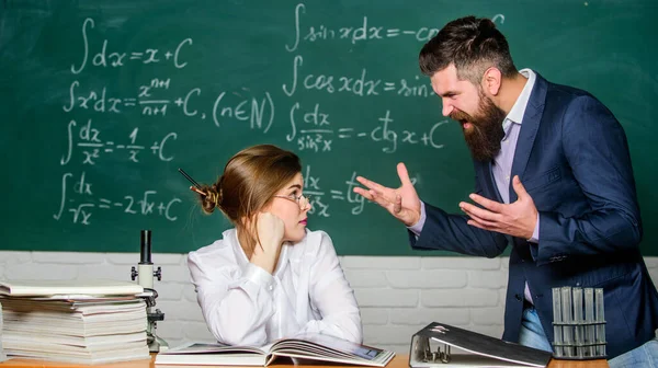 Tolerating lot of abuse from him. Pretty woman experience abuse in school. Victim of emotional abuse. Bearded man verbally abuse teacher or studen — Stock Photo, Image