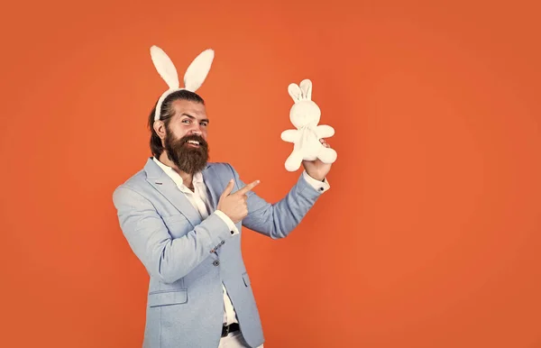 mature male wear rabbit ears. easter bunny man. happy easter. bearded man wear bunny ears. Egg hunt. spring holiday celebration. funny male hipster. brutal man having fun. Easter Bunnies