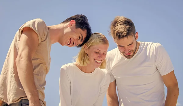 Group of people look down. heaven concept. look from success heights. happy woman and two men. cheerful friends. friendship relations. family bonding and love. just look at that — Stock Photo, Image