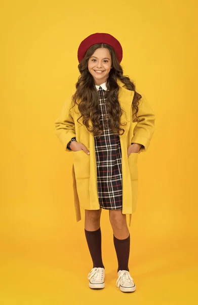 Happy kid in yellow raincoat, autumn — Stock Photo, Image