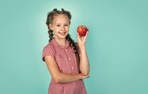 natural and healthy. happy childhood. kid eat apple. child with fruit. teen girl carry apples. autumn harvest. spring season fruits. full of vitamins. organic food only. Hot summer
