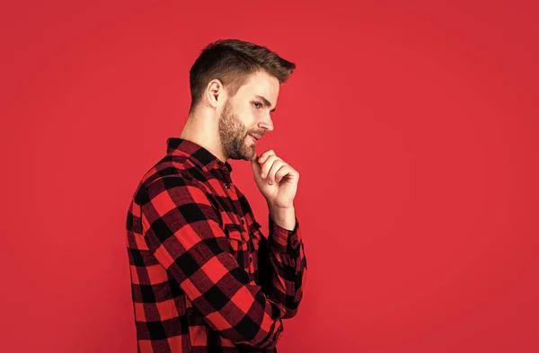 well groomed hairstyle. male beauty and fashion look. hipster checkered shirt for bearded guy. unshaven handsome man with bristle. hairdresser concept. young and confident