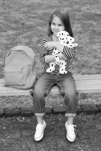 Biggest joy is playing. Happy kid play with toy dog outdoors. Childhood activity. Kindergarten and playschool. Toy shop. Game and play. Childs fantasy place — Stock Photo, Image