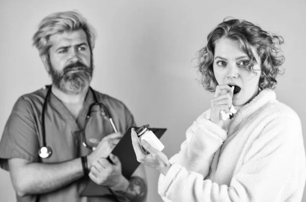 Taking pills. flu epidemic infection. for your immunity. healthcare and people. patient and doctor hold pills. woman with sore throat at nurse consultation. pharmacy. coronavirus from china — Stock Photo, Image