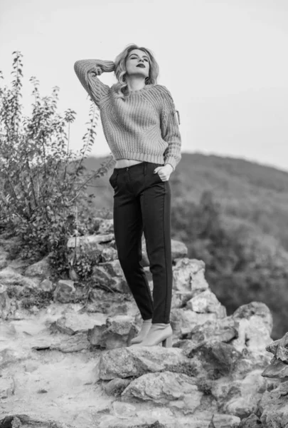 Woman warm sweater nature background defocused. Elegance concept. Fancy girl makeup face wear knitted sweater. Style is all about balance. Gorgeous lady feeling cozy in woolen sweater. Trendy clothes