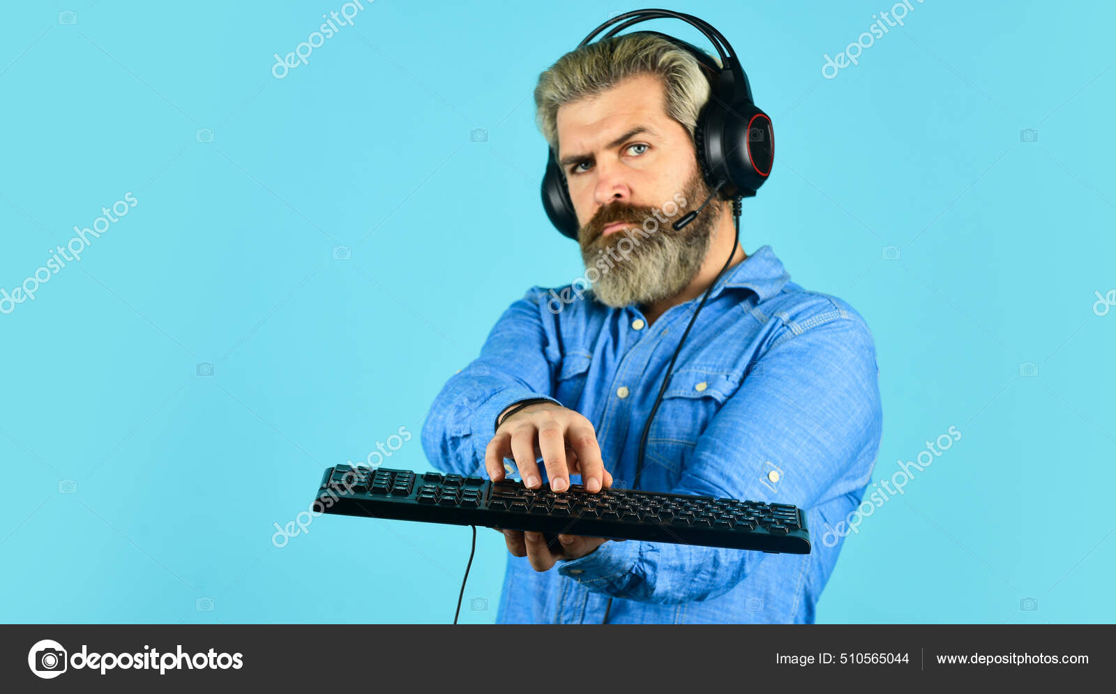 Gaming addiction. Man bearded hipster gamer headphones and keyboard. Play  computer games. Online gaming platform. Gaming modern leisure. Cyber sport  arena. Gaming PC build guide. Graphics settings Stock Photo by ©stetsik  510565044