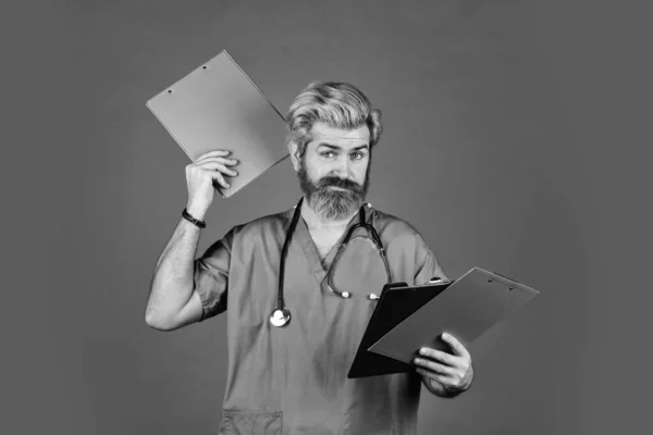 Medical treatment concept. Virus infection bacteria. Hospital department. Man bearded handsome doctor work at hospital. Hospital admission. Health care. Documents and protocols. Private clinic — Stock Photo, Image