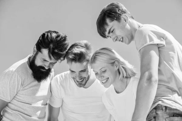 What is there. Group people excited look down. Woman and men happy sky background. Happiness in unity. Open mind for happiness. Carefree youth hang out together. See something adorable. Happiness — Stock Photo, Image