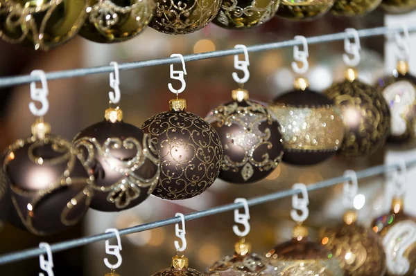 Christmas balls in a row, selective focus — Stock Photo, Image