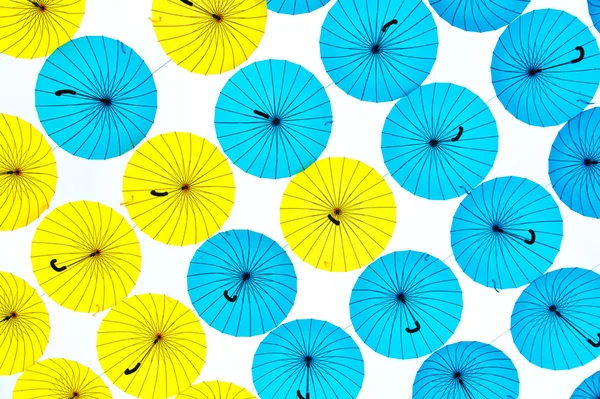 Bright colorful umbrellas background — Stock Photo, Image