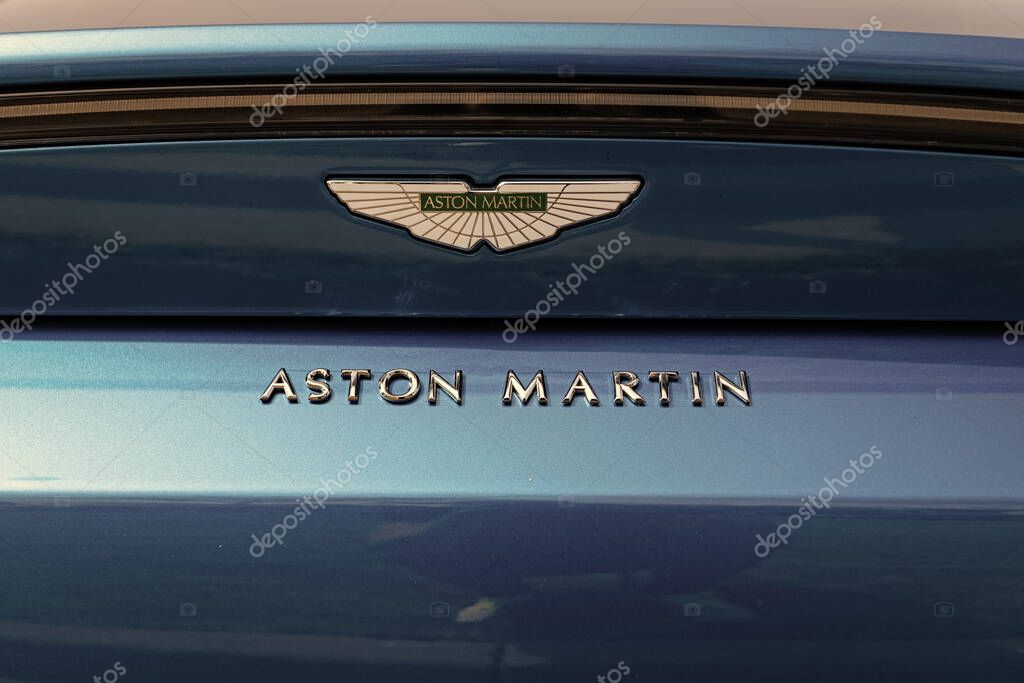 Chicago, Illinois, USA - September 08, 2024: 2020 Aston Martin Vantage coupe sportscar, logo view. Aston Martin Vantage. Convertible Aston Martin Vantage blue car