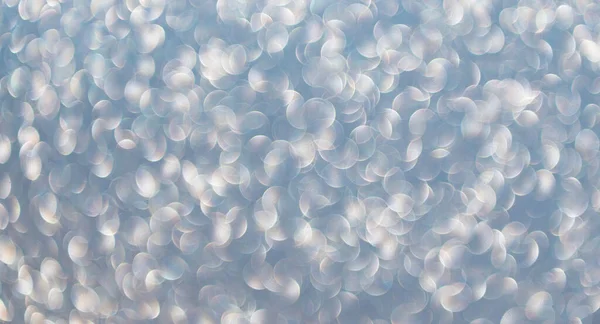 Parıldayan arka plan. Odaklanamayan ışıltı. Bokeh sahne arkası ışıltısı. Bokeh etkisi. Parıltı parlıyor. Bokeh 'in pırıl pırıl arka planı. Bulanık odaklı arka plan. Pırıl pırıl bir fon. Parıltı parıldıyor.