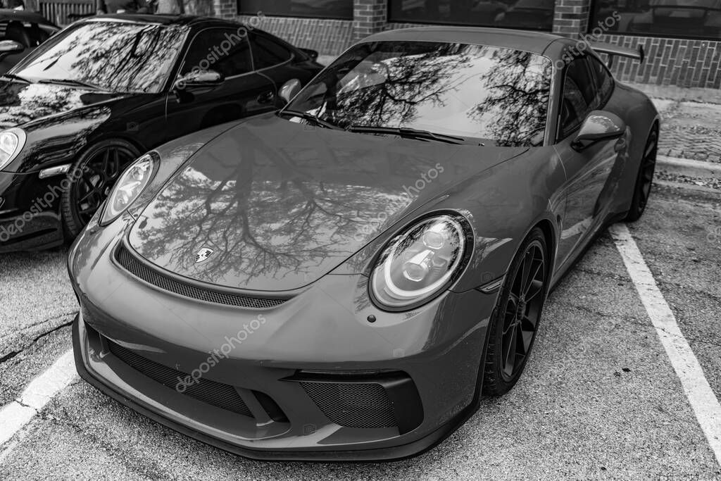 Chicago, Illinois - September 29, 2024: 2018 Porsche 911 GT3. Red 2018 Porsche 911 GT3 parked on the street