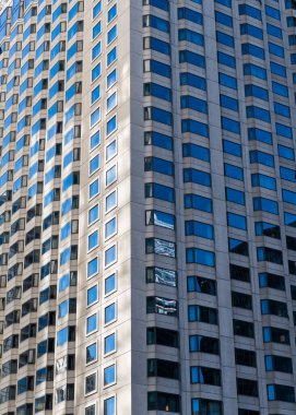 Building background. Glass building window. Architectural detail. Background of architecture. Modern glass background. Reflective glass background. Business architecture. Building architecture.