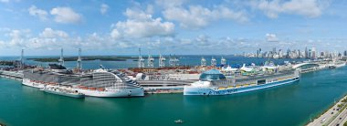 Miami, Florida, USA - May 17, 2025: Ship in Miami port. MSC World America and Icon of the seas cruise ship voyage. MSC cruises and Royal Caribbean International cruise line. Cruise ship vacation.