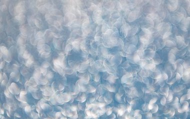 Parıldayan arka plan. Odaklanamayan ışıltı. Bokeh sahne arkası ışıltısı. Bokeh etkisi. Parıltı parlıyor. Bokeh 'in pırıl pırıl arka planı. Bulanık odaklı arka plan. Pırıl pırıl bir fon. Parıltı parıldıyor.