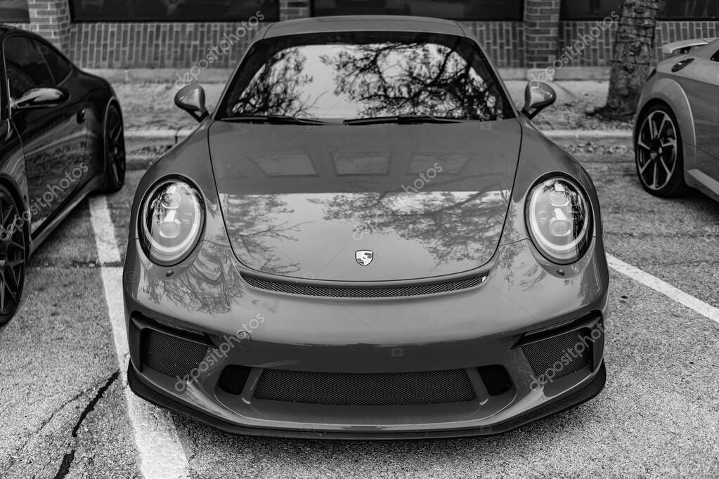 Chicago, Illinois - September 29, 2024: 2018 Porsche 911 GT3. Red 2018 Porsche 911 GT3 parked on the street