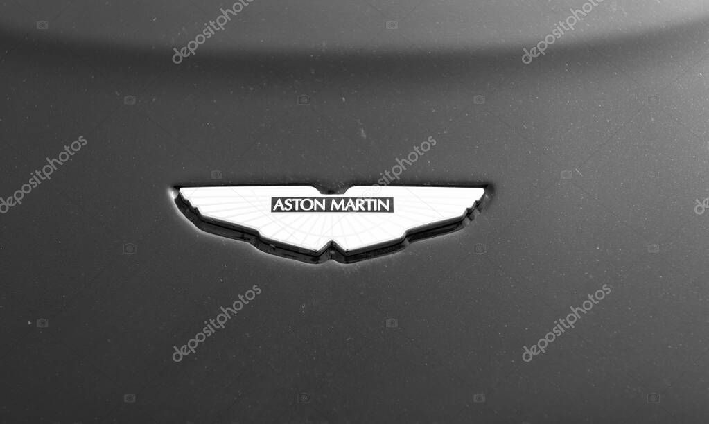 Chicago, Illinois, USA - September 08, 2024: Aton Martin on blackbackground. Logo of the british luxury sports car manufacturer Aston Martin founded in 1913..