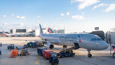 Los Angeles, California, USA - April 29, 2025: American airlines group plane departure in airport. Airport terminal. Plane arrival American airline. Departure and arrival at airport. American airline.