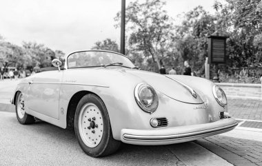 Chicago, Illinois - September 29, 2024: Classic Porsche 356 Speedster silver color. Vintage Porsche 356 Speedster parked on the street. corner view. Retro Porsche 356 Speedster convertible Coupe in Chicago