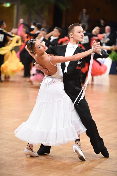 Ballroom dance couple dancing at the competition