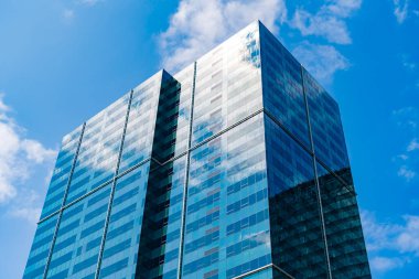 Glass reflective skyscraper. City architecture. Architecture office building. Perspective skyscraper. Minimalist glass architecture. Business skyscraper building. Architectural building business area.