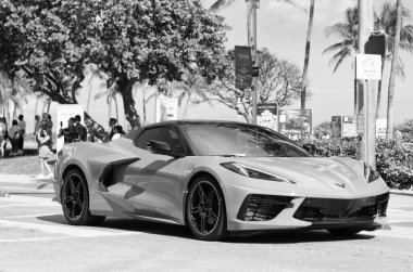 Miami, Florida, ABD - 20 Aralık 2024 Chevrolet Corvette 'in spor arabası. Chevy Corvette 'in açık hava turuncu arabası. Chevrolet Corvette, yan görüş. Chevrolet Corvette C8 Chevy spor araba.