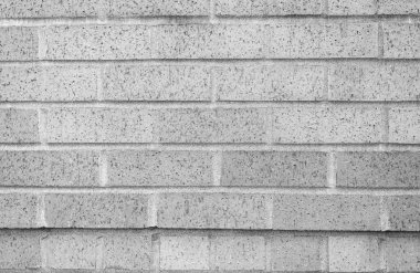 Malzeme konsepti. Tuğla duvarın yüzeyi. Kalıplaşmış kahverengi fon. Duvar dokusu arka planı. Tuğla duvar yapısı. Tuğla ustalığı geçmişi. Kırsal tuğla duvar.