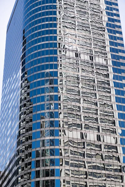 Building background. Glass building window. Architectural detail. Background of architecture. Modern glass background. Reflective glass background. Business architecture. Building architecture.