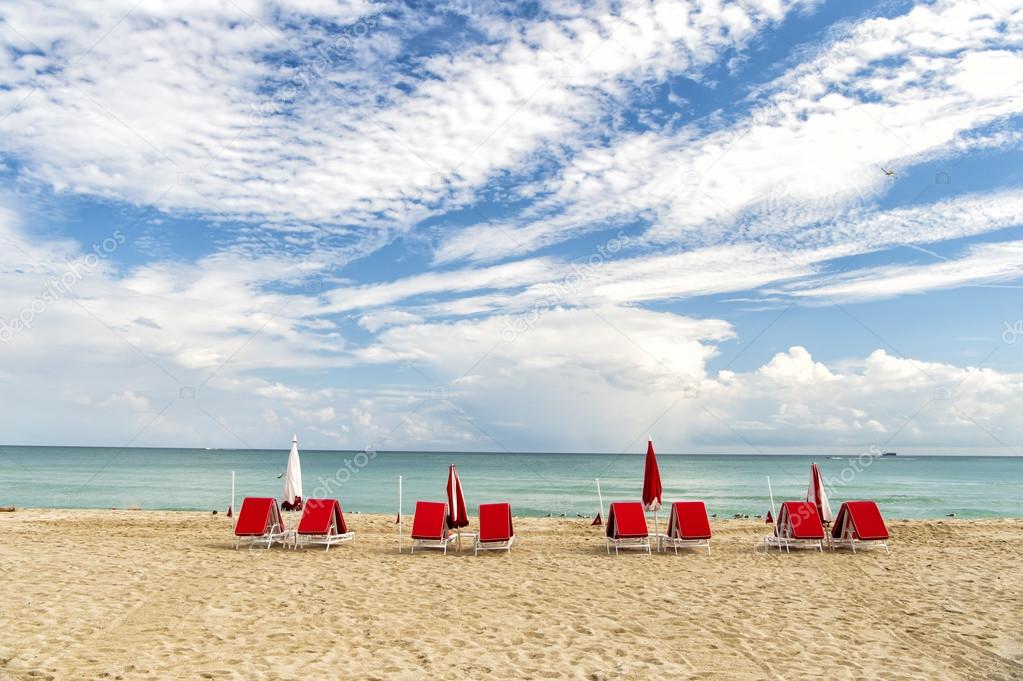 Red deck chairs in South beach