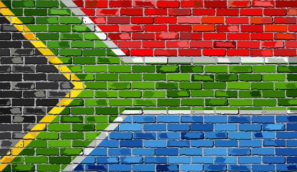 Flag of South Africa on a brick wall — Stock Vector