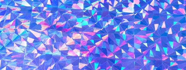 Holographic colorful purple blue lights festive background. Abstract geometric pattern backdrop. Social media banner or header.