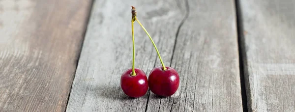 Pair Red Ripe Cherries Rustic Weathered Wooden Table Social Media — Stock Photo, Image