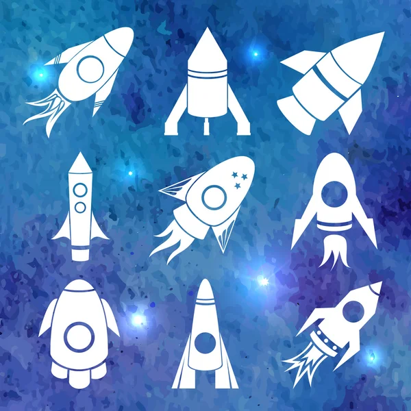 White rockets icons on watercolor background — Stock Vector