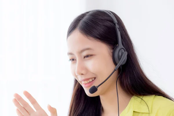 Young asian business woman using laptop computer for video conference online with social distancing, businesswoman working with video call, new normal, communication and work from home concept.
