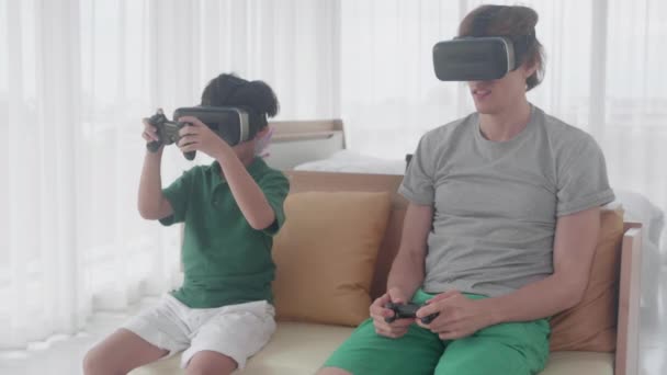 Young Asian Father Son Sitting Playing Video Game Virtual Reality — Stock Video