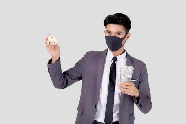 Joven Hombre Negocios Asiático Cara Máscara Retención Dinero Dólar Casa —  Fotos de Stock