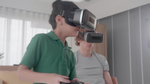 Young Asian Father Son Sitting Playing Video Game Virtual Reality — Stock Video