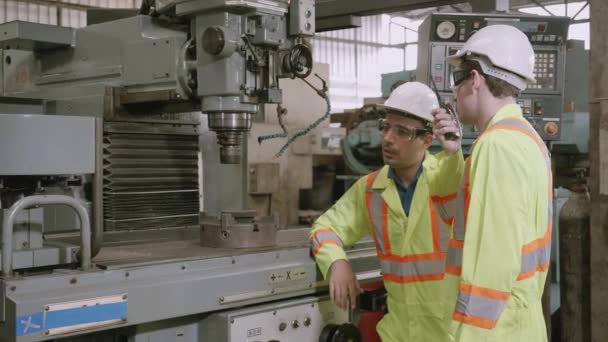 Two Young Maintenance Man Uniform Checking Machine Calling Radio Phone — Stock Video