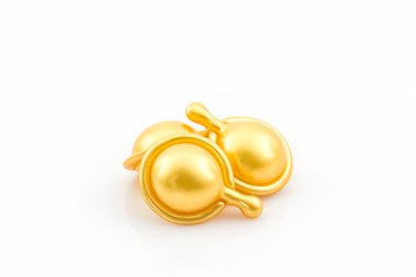 Saç vitamin serum kapsül altın rengi.