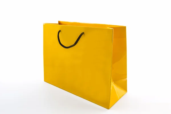 Blank yellow paper shopping bag. — Stock Photo, Image