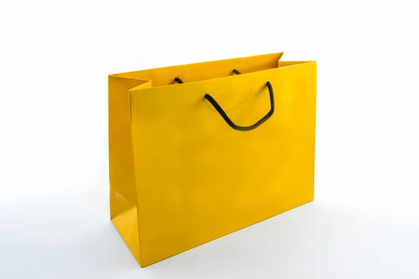 Üres sárga papír bevásárló táska. — Stock Fotó
